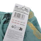 Short bleu imprimé ananas et feuilles — 9 mois