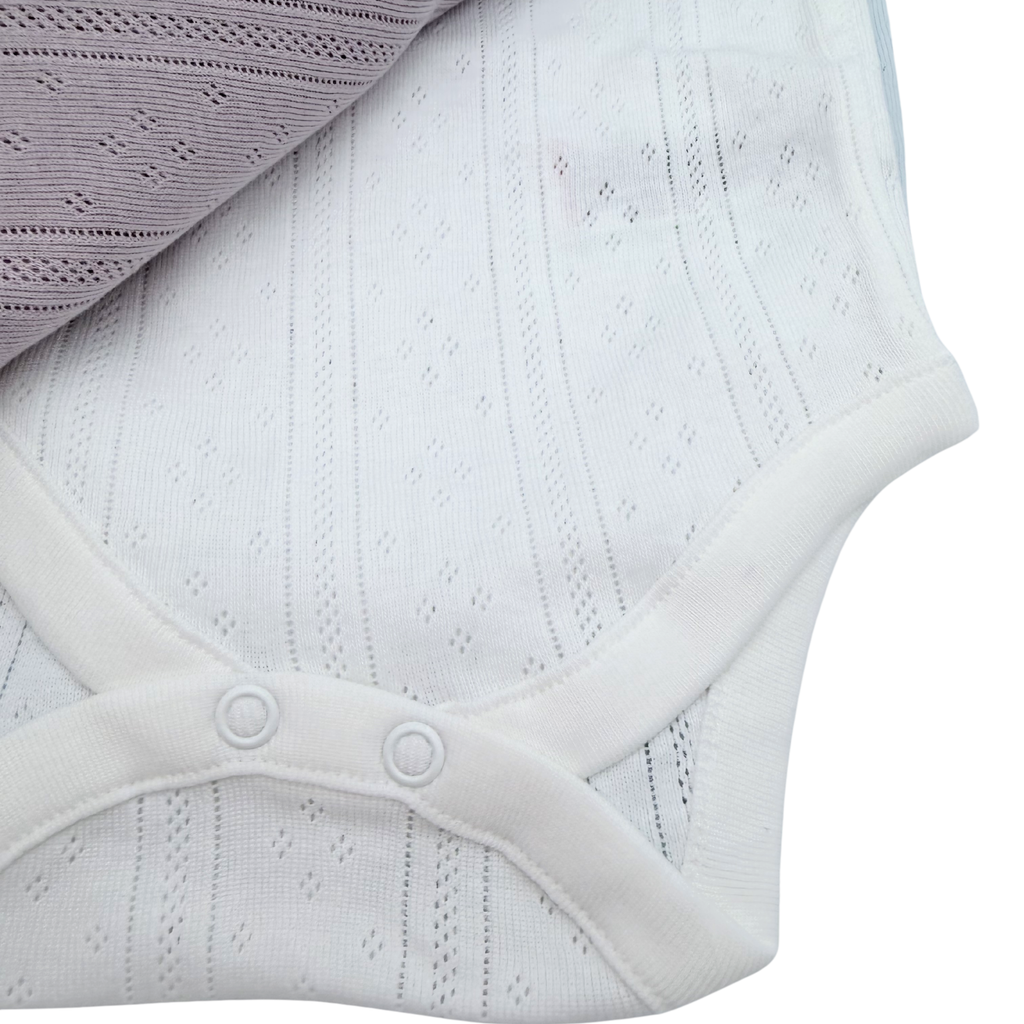 Lot de 5 bodies sans manches pastel — 0-3 mois