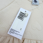 Robe bébé beige à cœurs relief — 6 mois