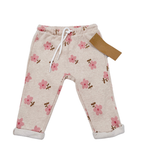 Pantalon beige à fleurs roses - 9 mois