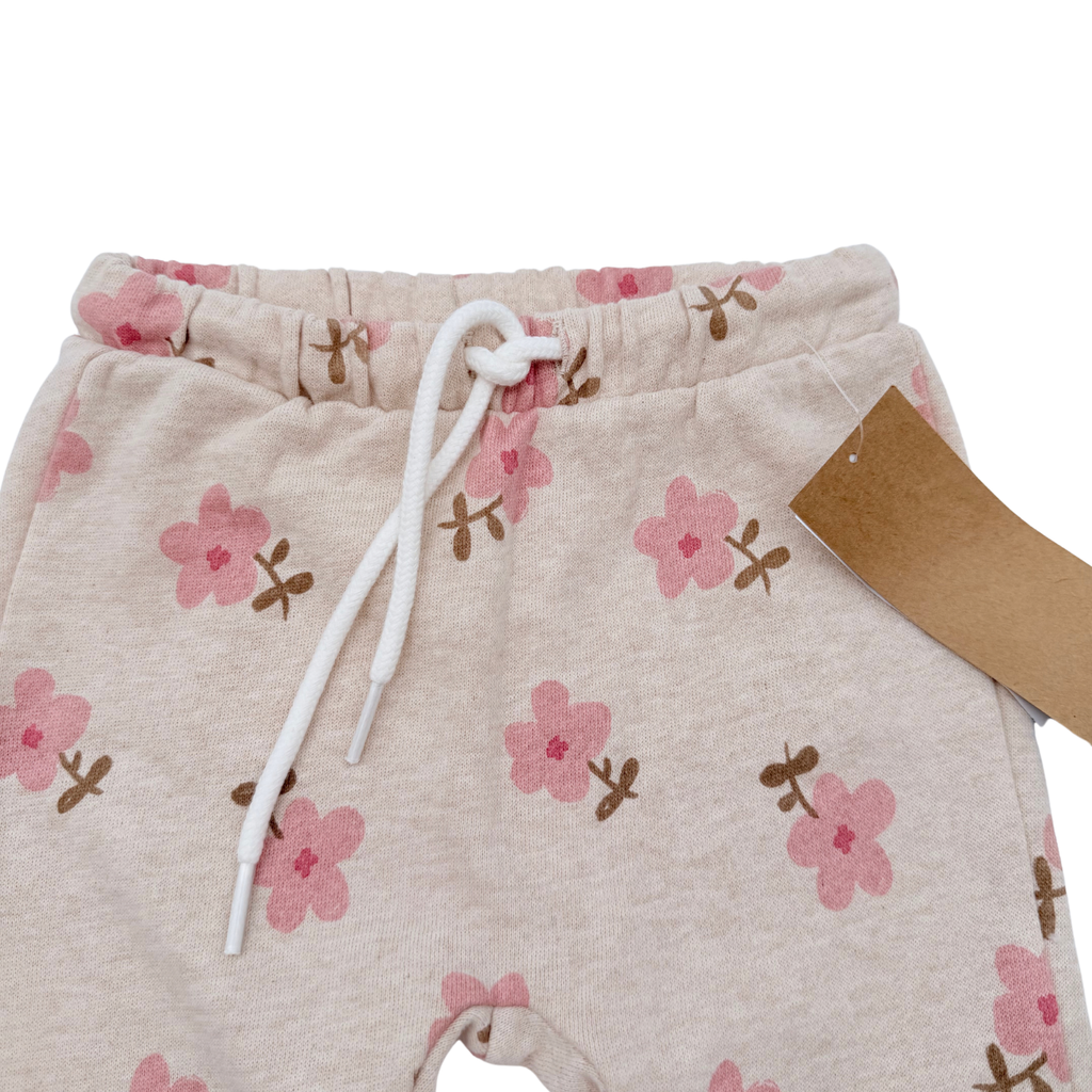 Pantalon beige à fleurs roses - 9 mois