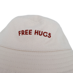 Bob bébé réversible beige à cœurs "Free Hugs" — 6-12 mois