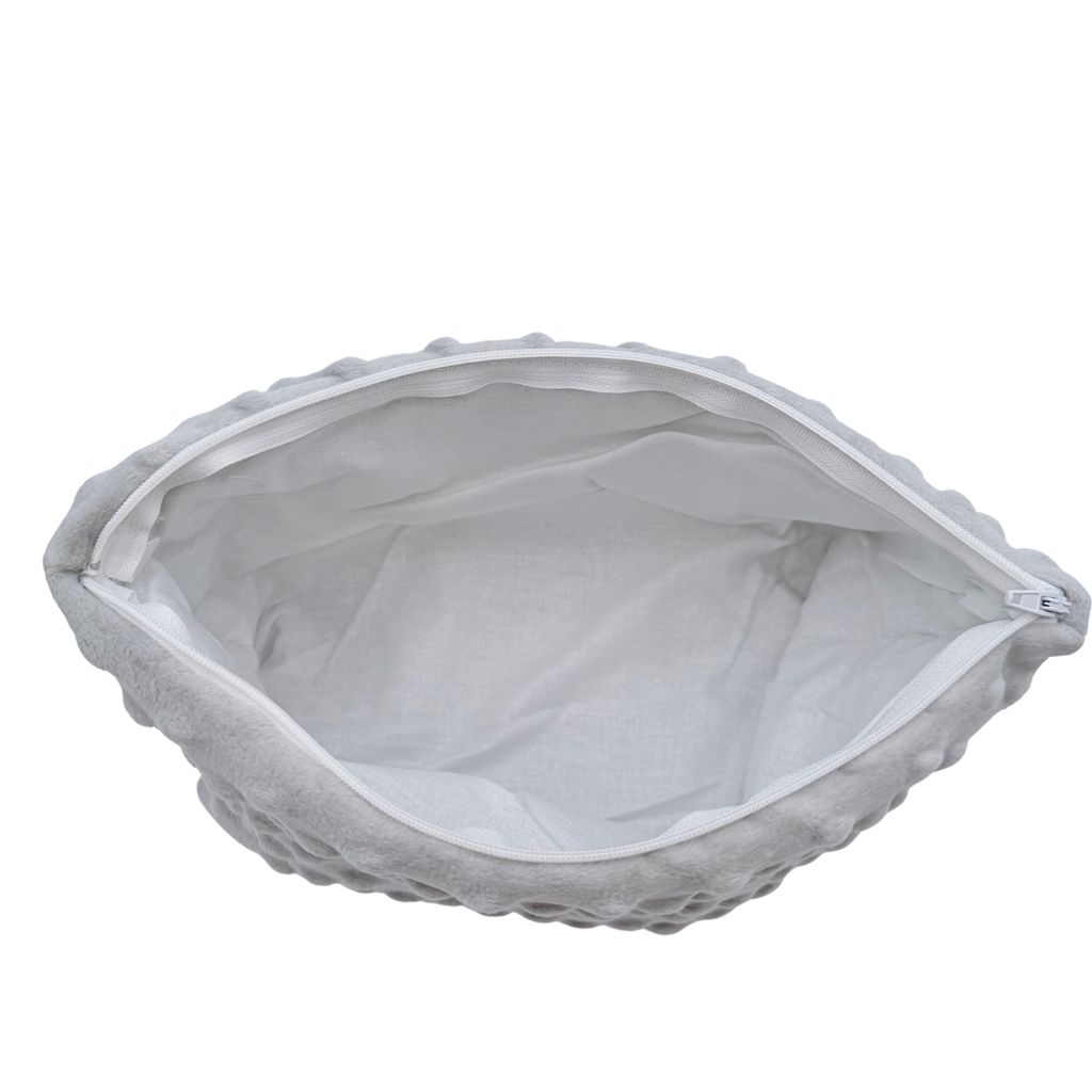 Trousse de toilette bébé grise à pois en relief