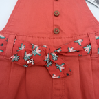 Salopette short corail à ceinture fleurie — 9 mois