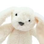 Peluche lapin écru aux longues oreilles