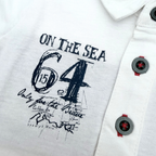 Polo blanc imprimé pirate — 6 mois
