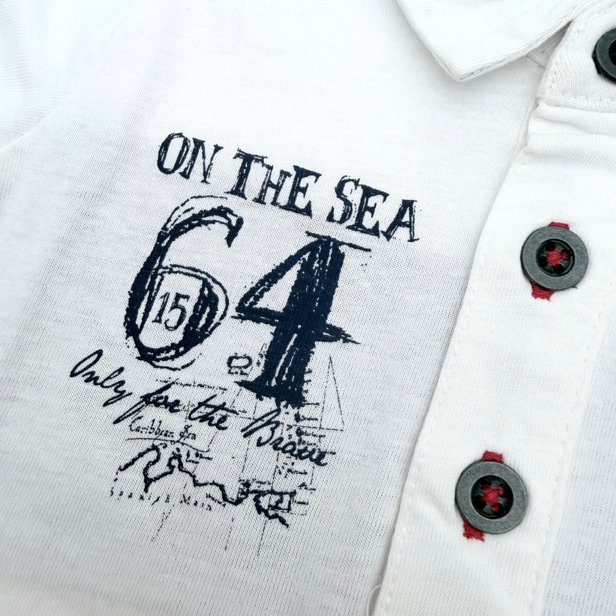 Polo blanc imprimé pirate — 6 mois