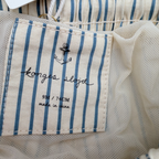 Short de bain rayé écru et bleu — 9 mois