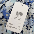 Robe à fleurs bleues à volants — 3-4 ans