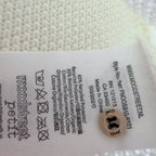 Cardigan bébé écru en maille — 9 mois