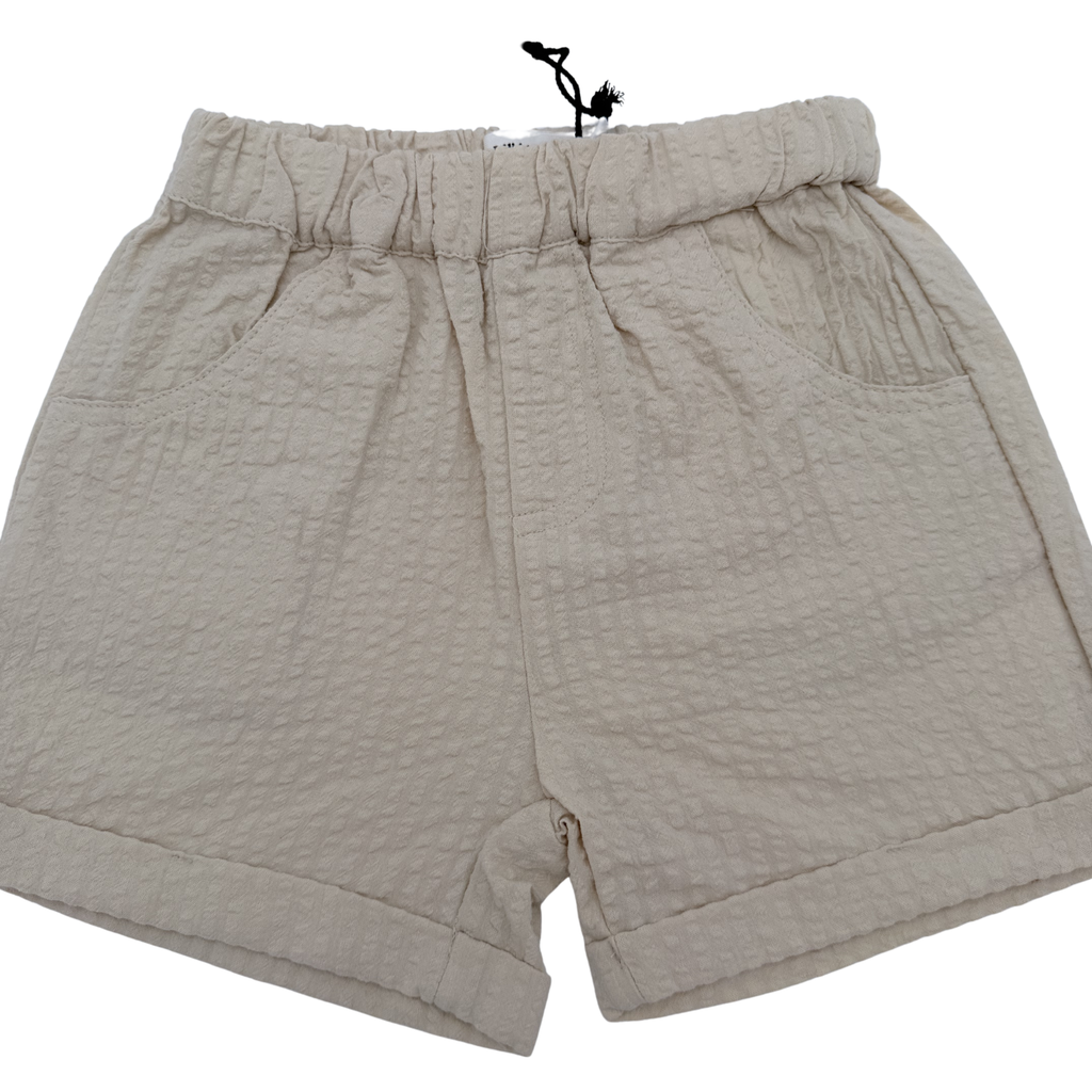 Short texturé beige — 2-3 ans