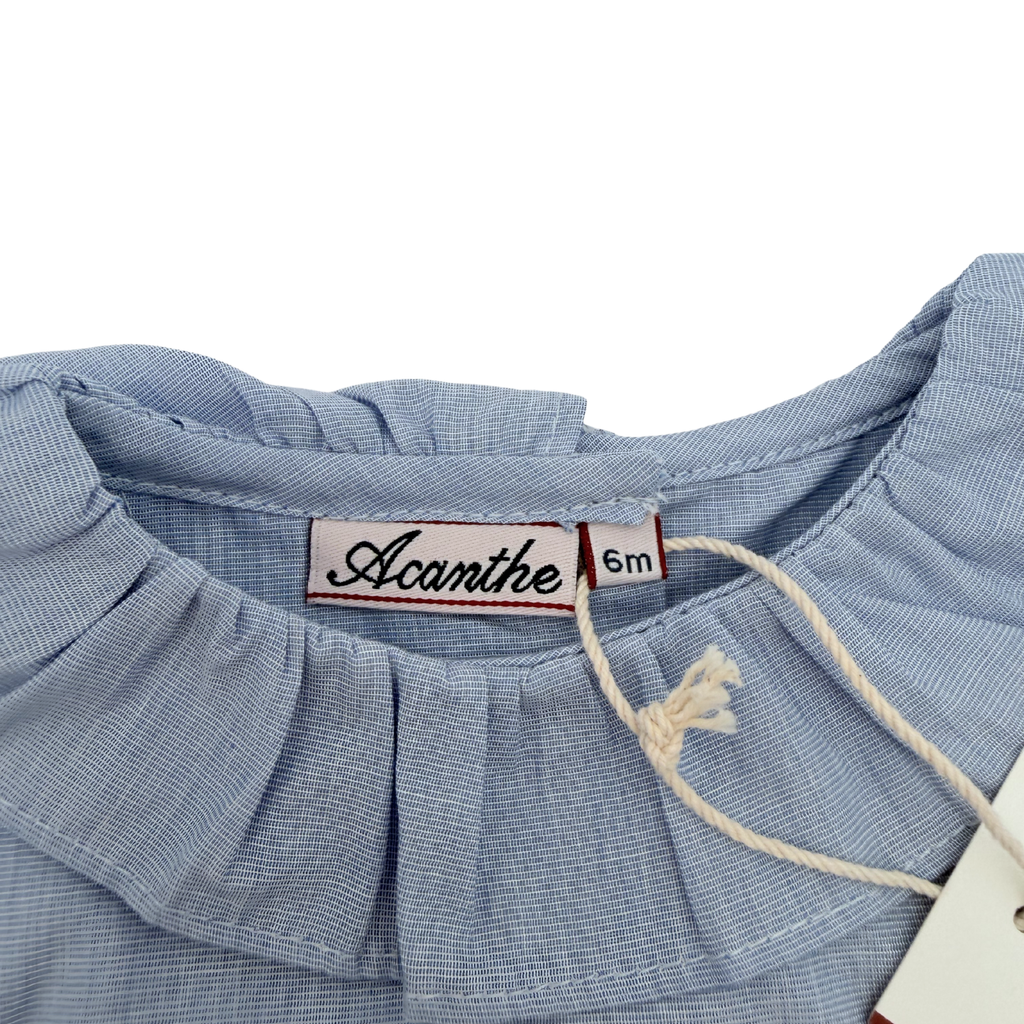 Blouse bleu clair à col volanté — 6 mois