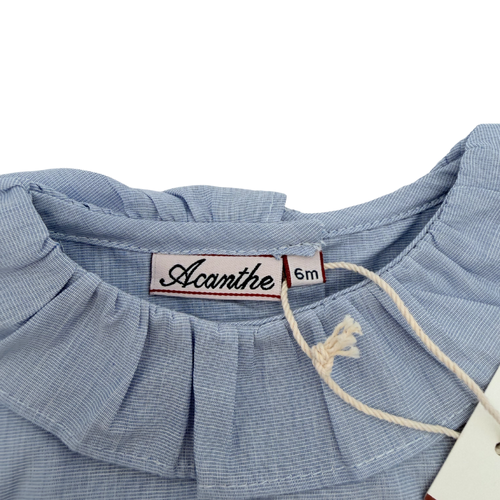 Blouse bleu clair à col volanté — 6 mois