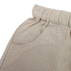 Short texturé beige — 5-6 ans