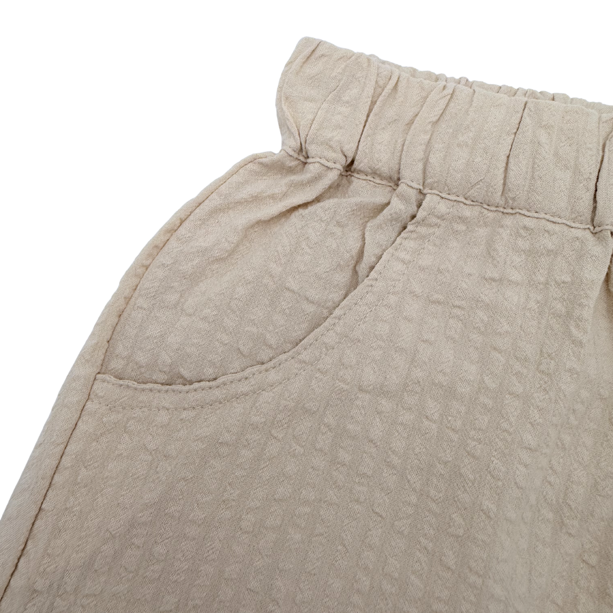 Short texturé beige — 5-6 ans