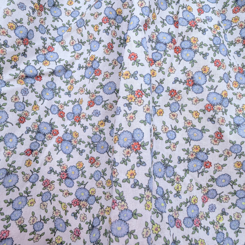 Robe à fleurs et bretelles à nouer — 2 ans