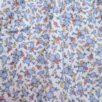 Robe à fleurs et bretelles à nouer — 2 ans