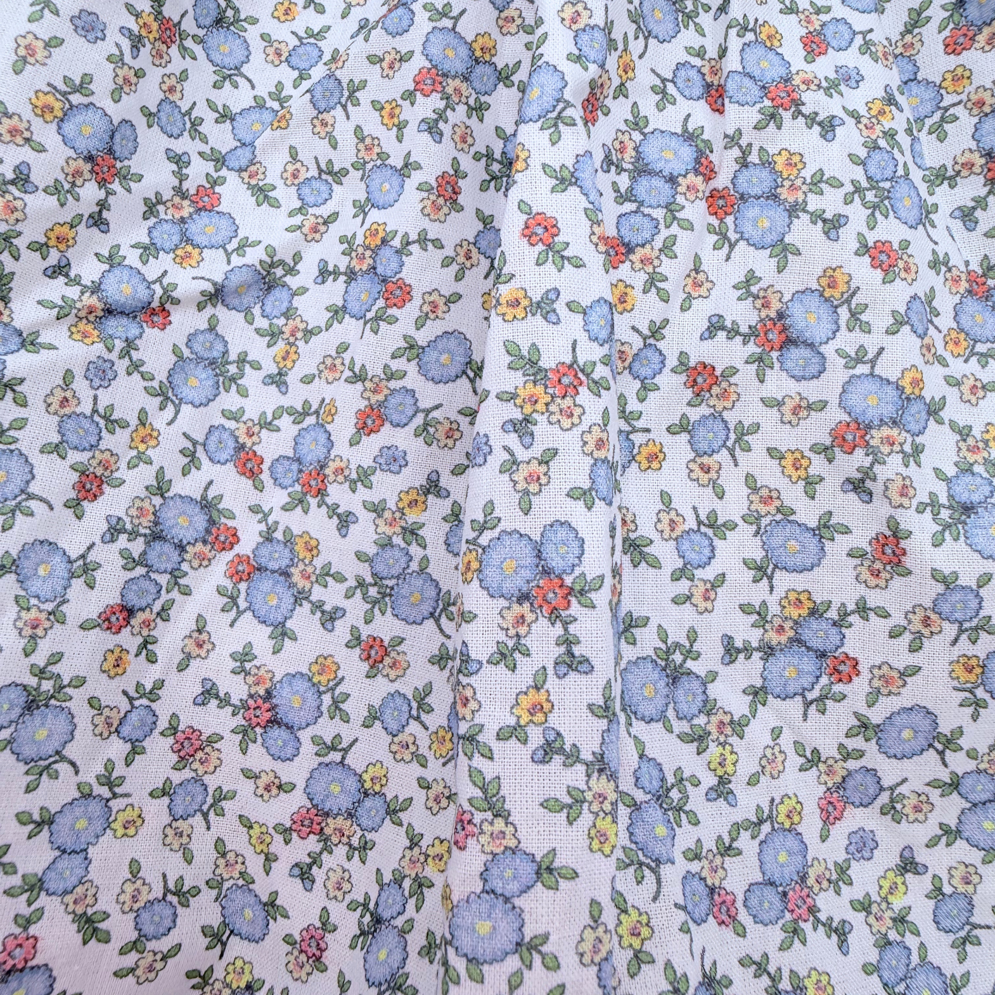 Robe à fleurs et bretelles à nouer — 2 ans