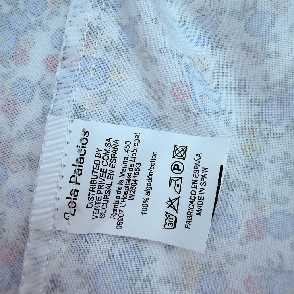 Robe à fleurs et bretelles à nouer — 2 ans