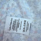 Robe à fleurs et bretelles à nouer — 2 ans