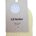 Chaussettes bébé jaunes en coton biologique à bordure dentelle - 2-6 mois