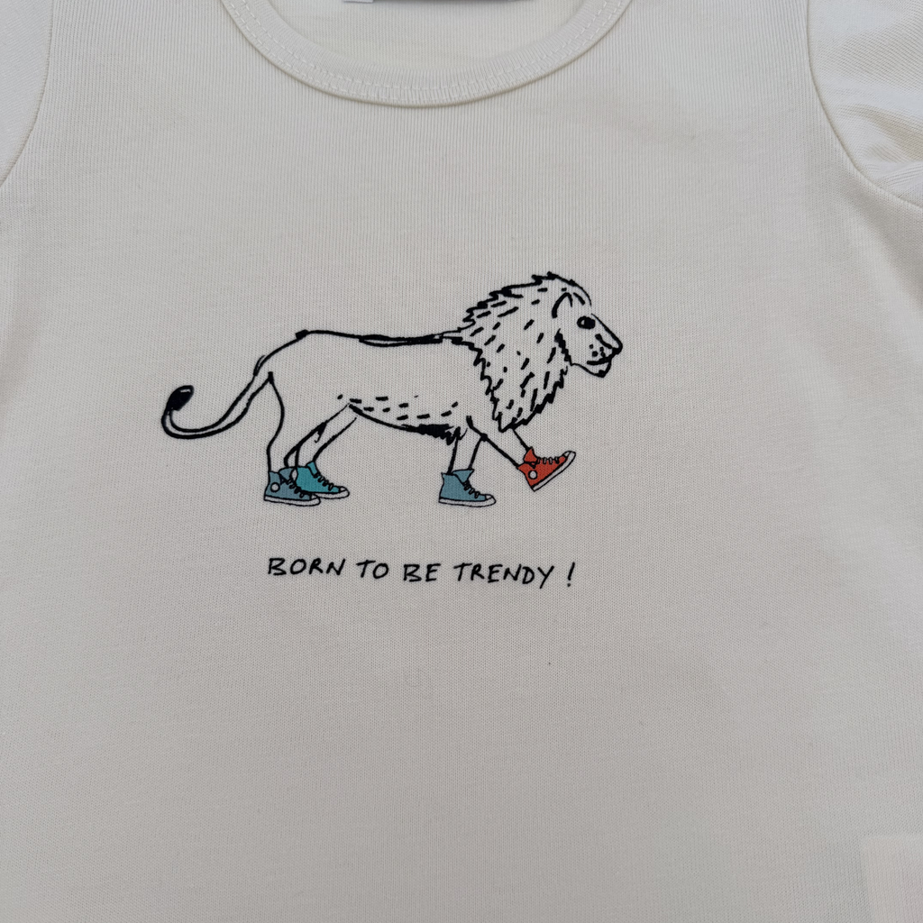 Ensemble t-shirt écru et short vert d’eau imprimé lions — 6 mois