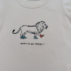 Ensemble t-shirt écru et short vert d’eau imprimé lions — 6 mois