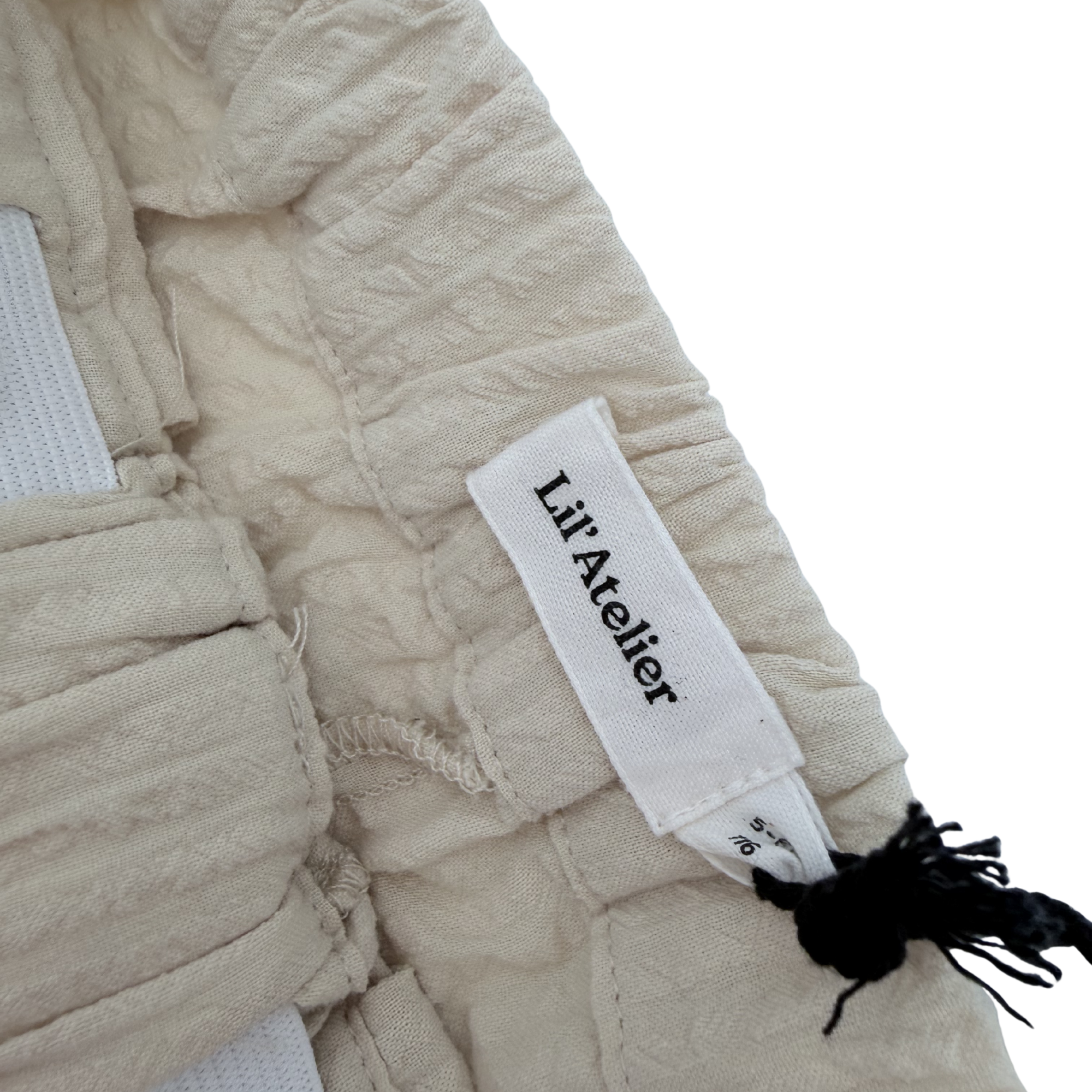 Short texturé beige — 5-6 ans