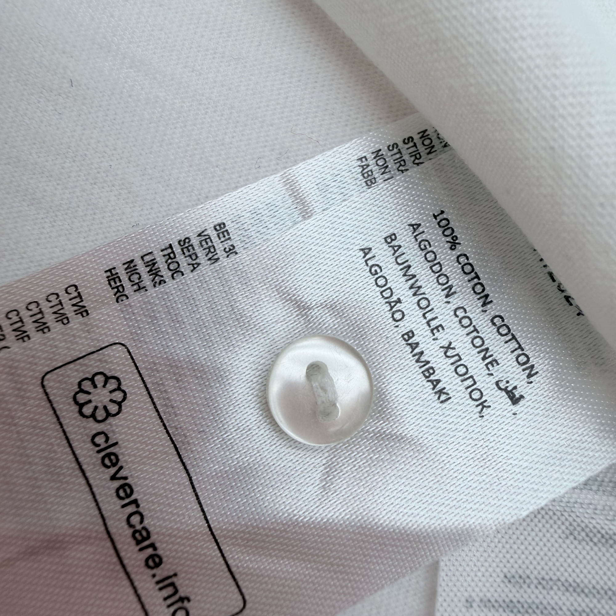 T-shirt blanc à col volanté et papillons — 24 mois