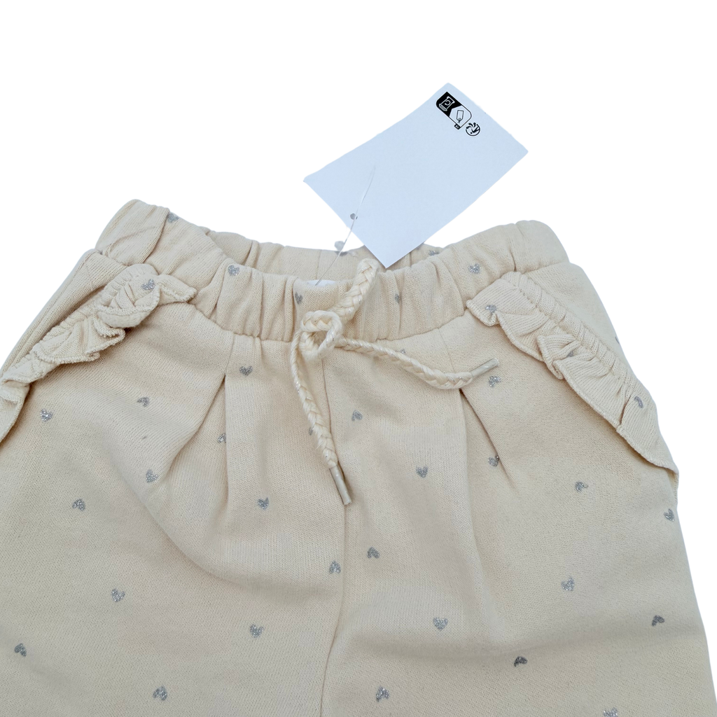 Pantalon beige à petits cœurs - 6 mois