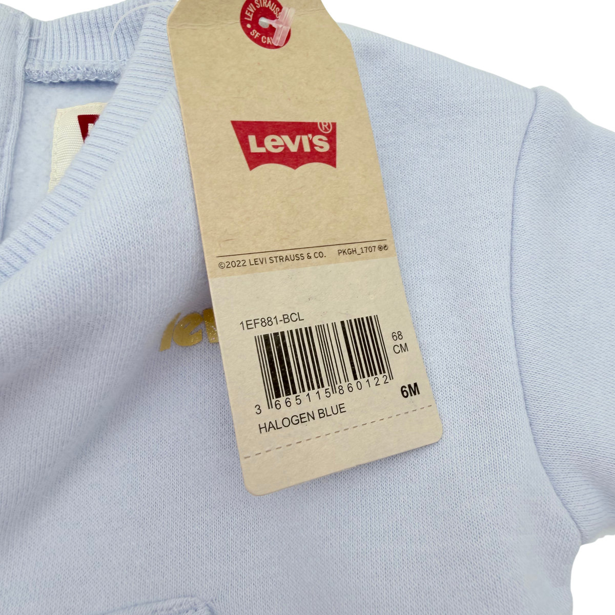 Sweat bleu clair avec poche volantée - 6 mois