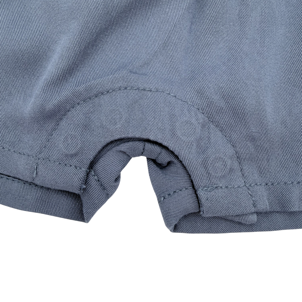 Combishort bleu à volants et broderies fleurs — 6 mois