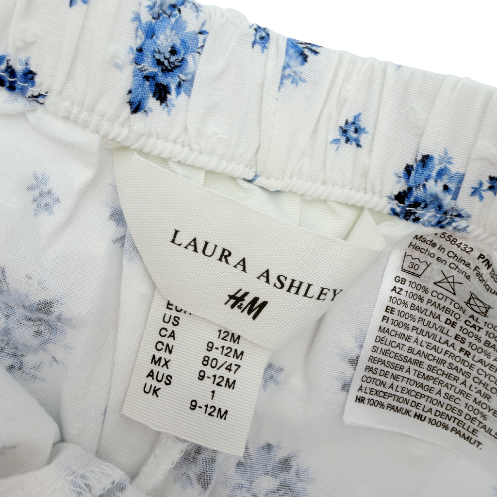 Ensemble blouse et short fleuris blanc et bleu – 9-12 mois