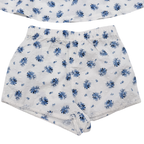 Ensemble blouse et short fleuris blanc et bleu – 9-12 mois