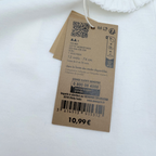 T-shirt écru col volanté — 12 mois