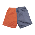 Short bicolore bleu et terracotta – 18 mois