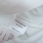 Blouse blanche à nœuds - 5 ans