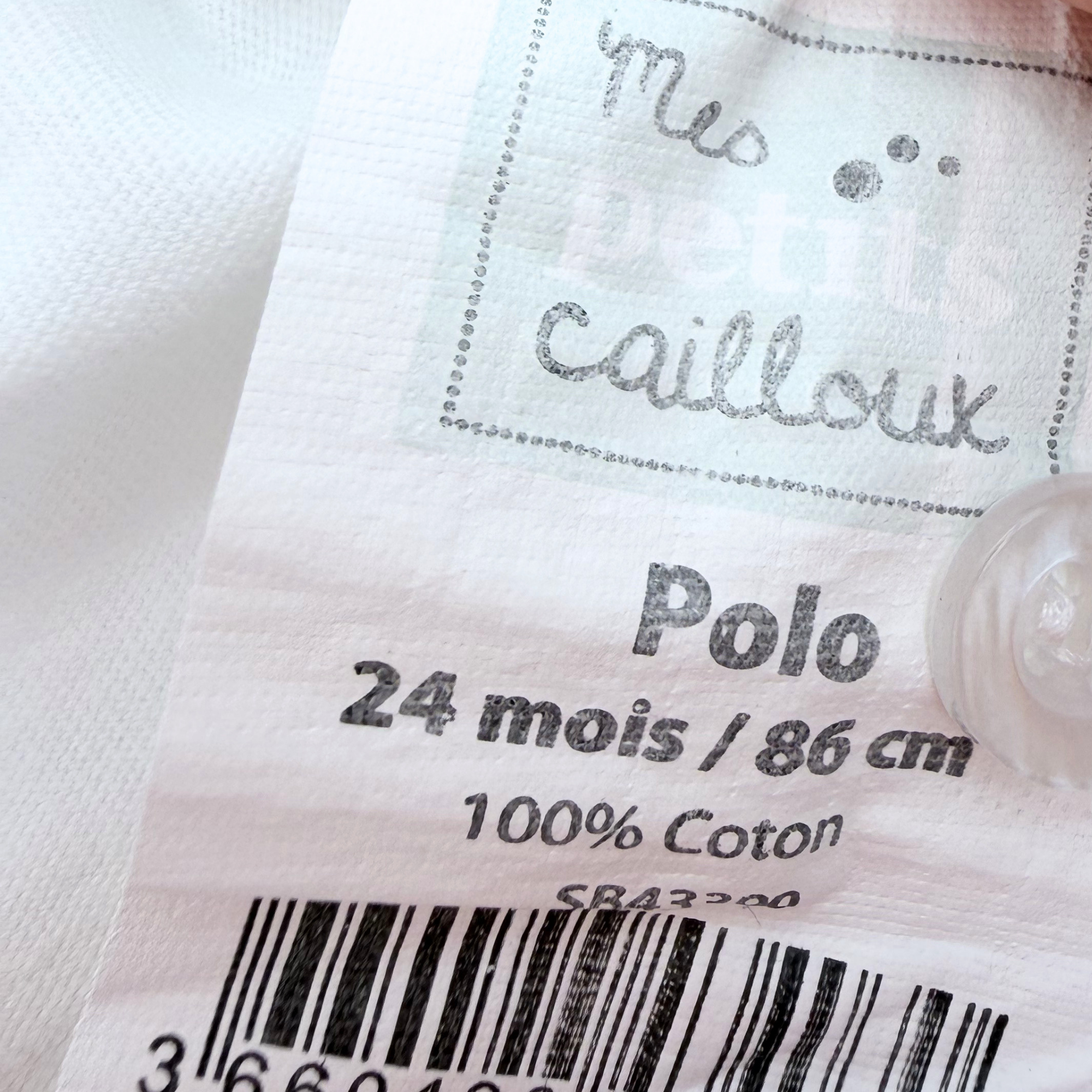 Polo blanc et bleu “Petit Capitaine” — 24 mois