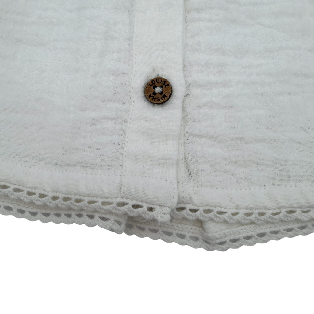 Blouse sans manches brodée — 6 mois