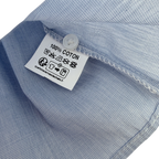 Blouse bleu clair à col volanté — 6 mois