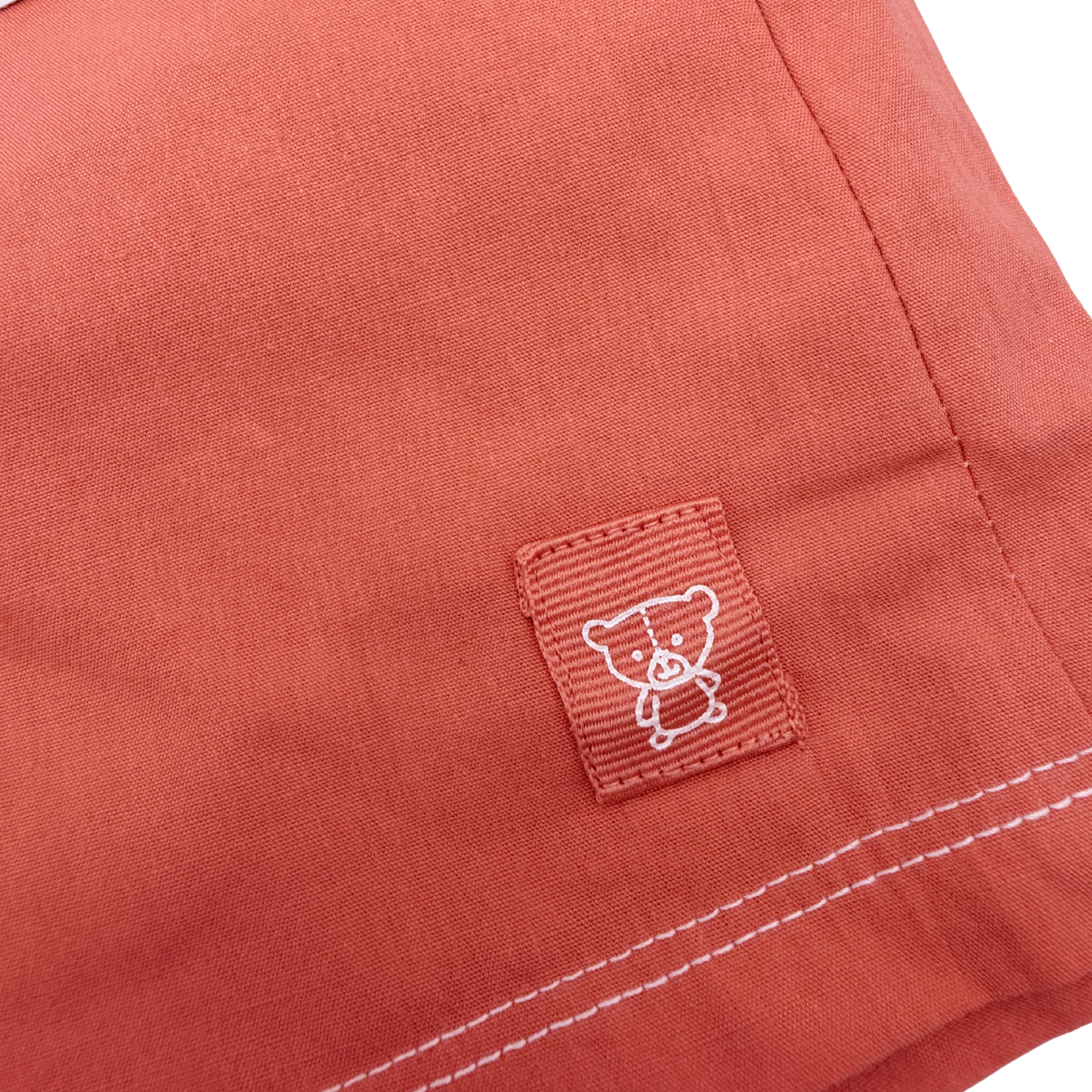 Short bicolore bleu et terracotta – 18 mois