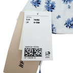 Chapeau blanc à fleurs bleues – 6-12 mois