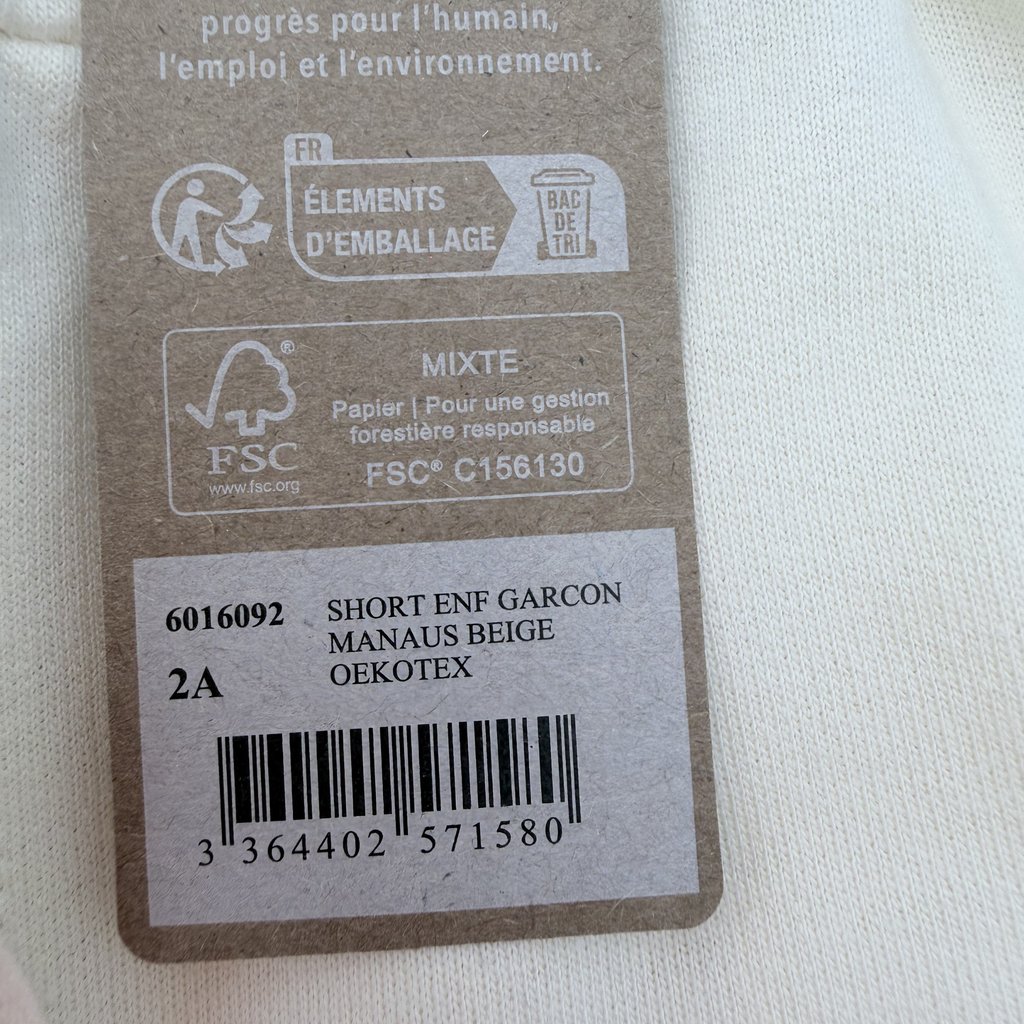 Short molleton écru à revers — 2 ans