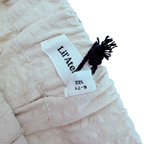 Short texturé beige — 6-7 ans