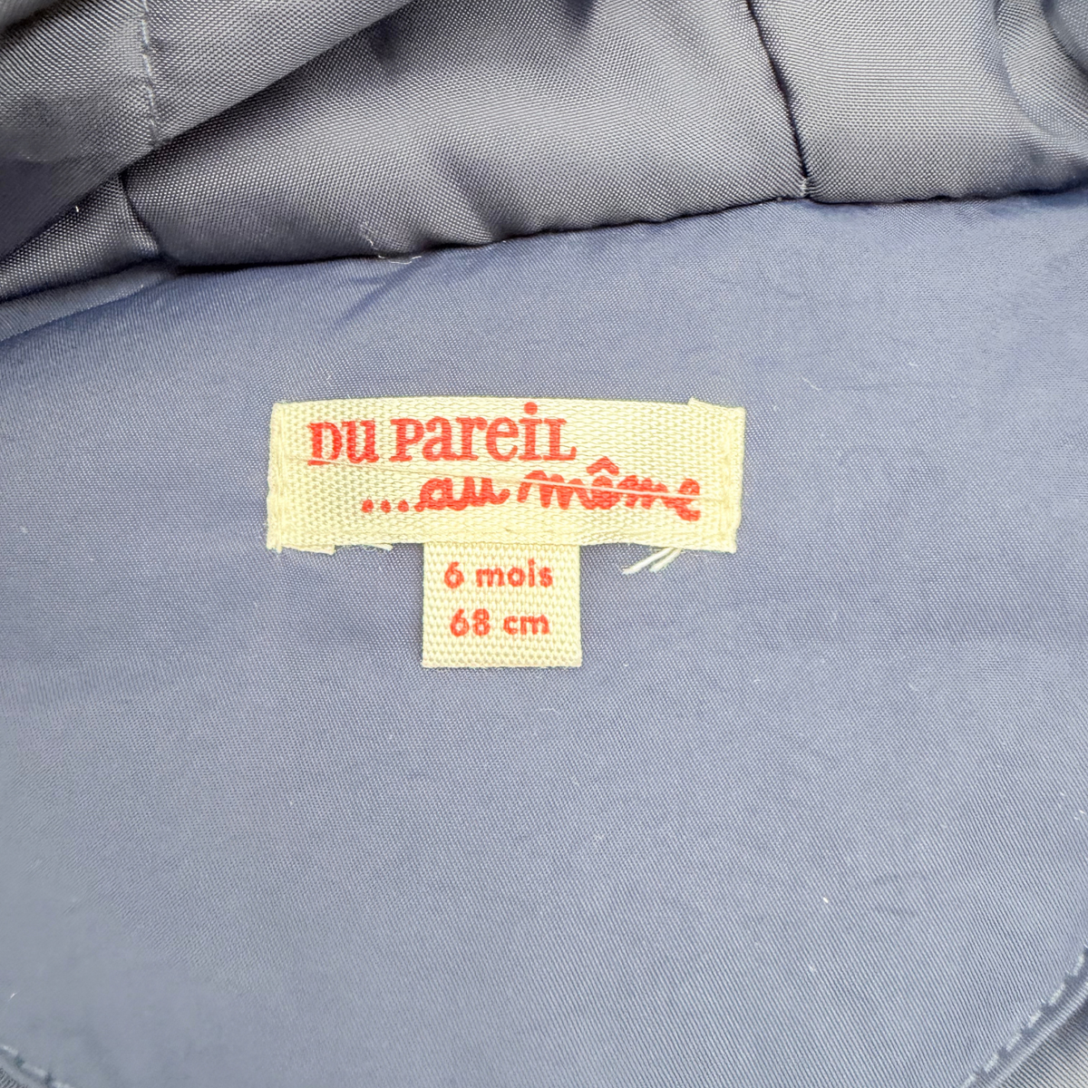 Veste bébé déperlante bleu marine et écru à capuche - 6 mois