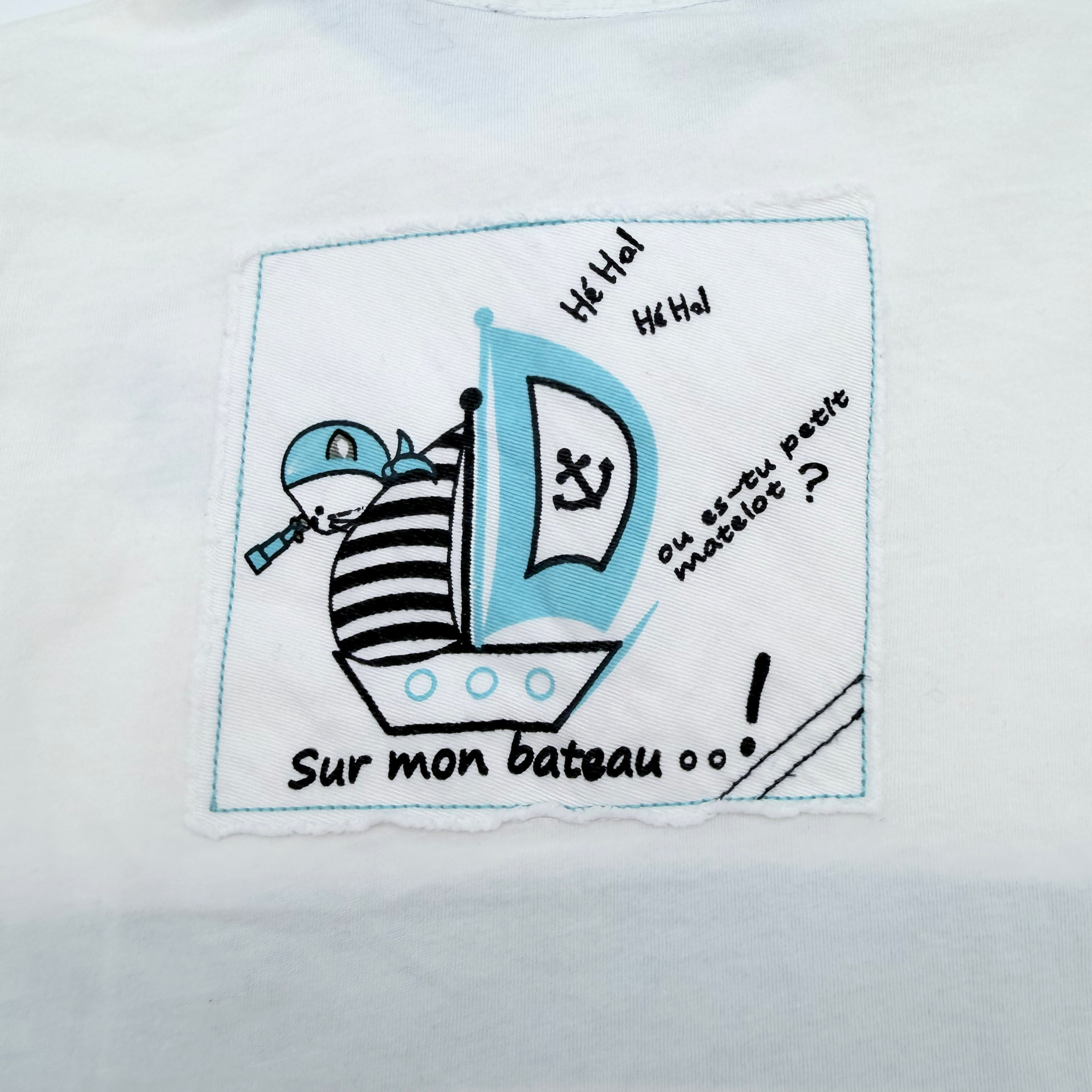 Polo blanc et bleu “Petit Capitaine” — 24 mois