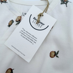 Pyjama blanc imprimé petites oranges — naissance