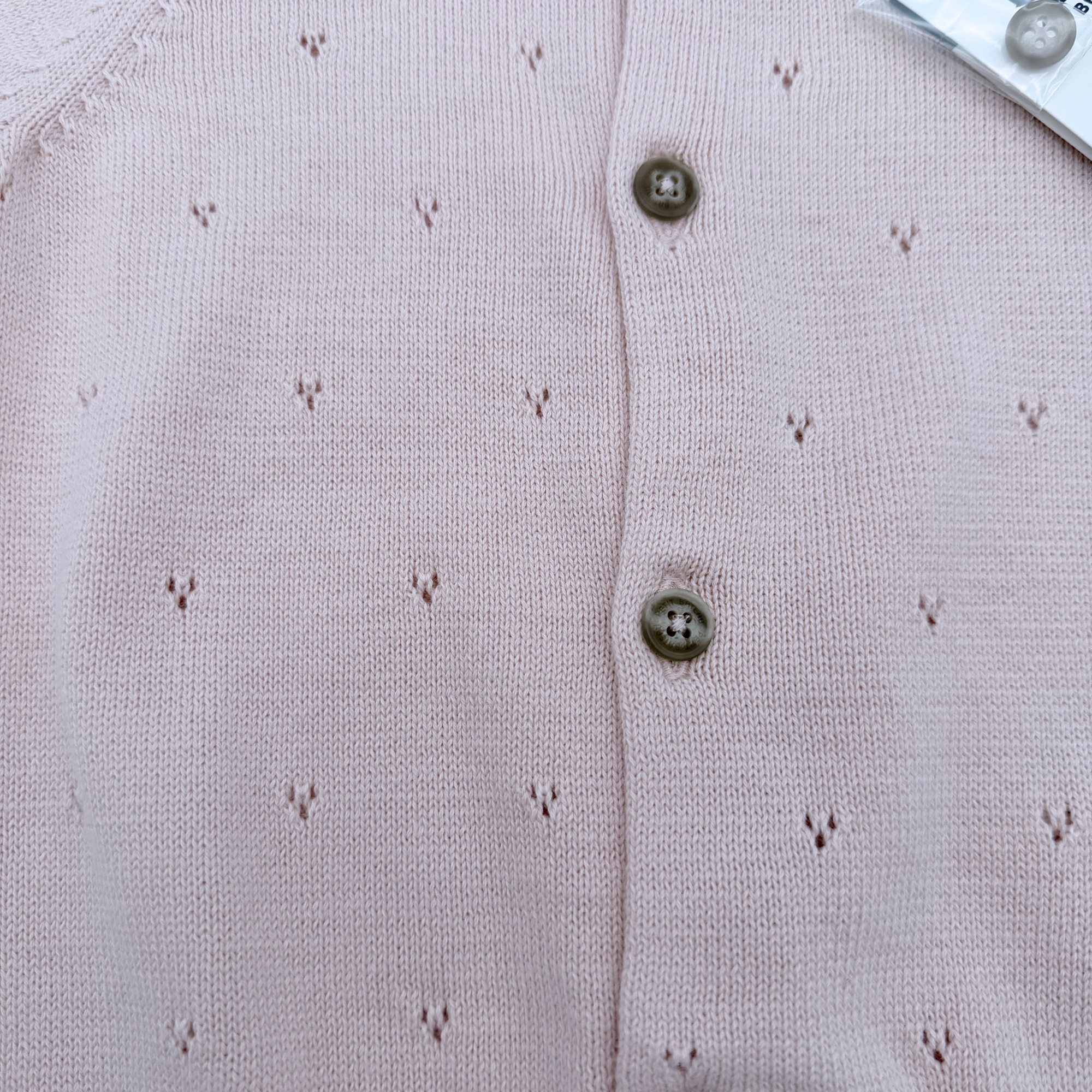 Gilet en maille ajourée rose pâle — 12 mois