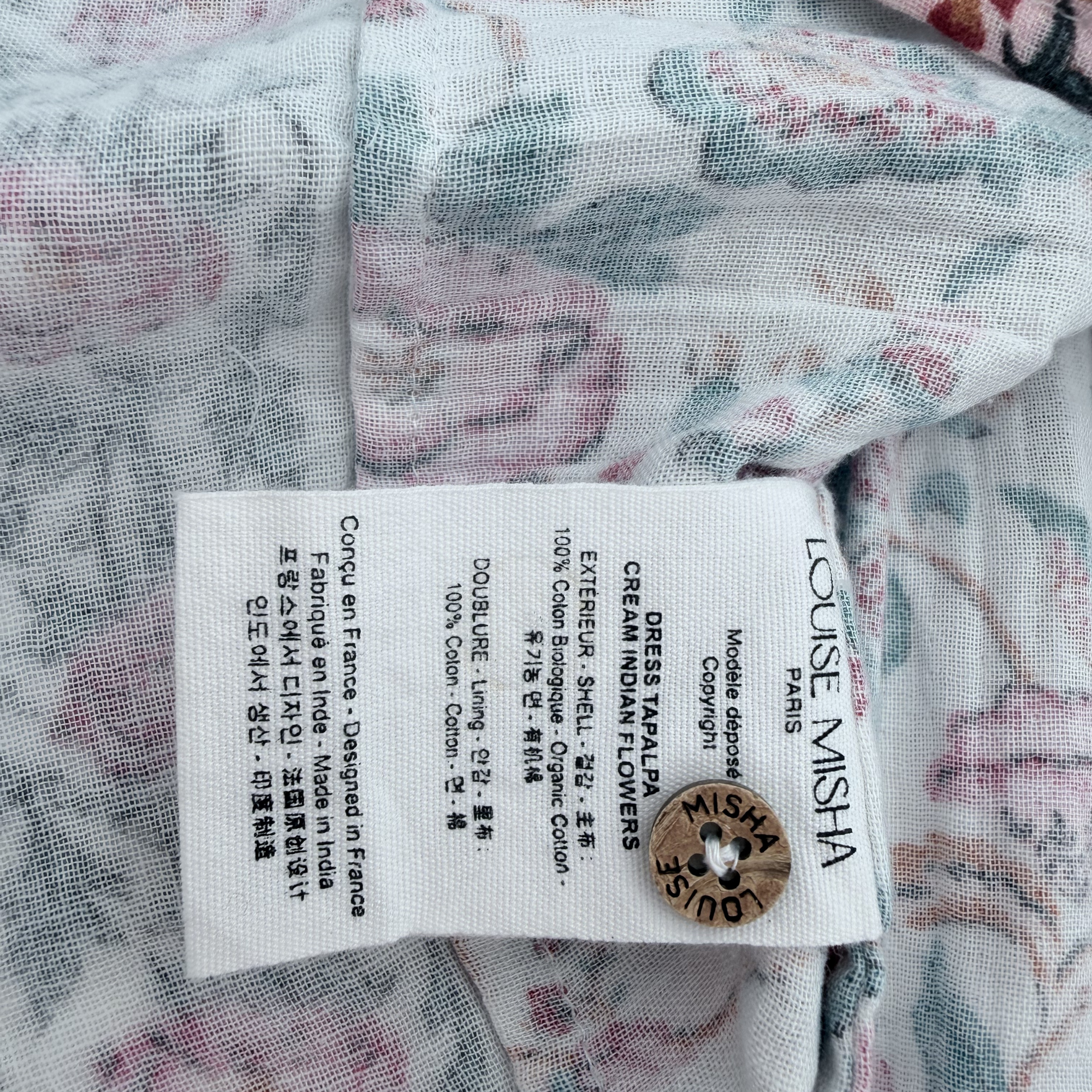 Robe sans manches fleurie — 9 mois