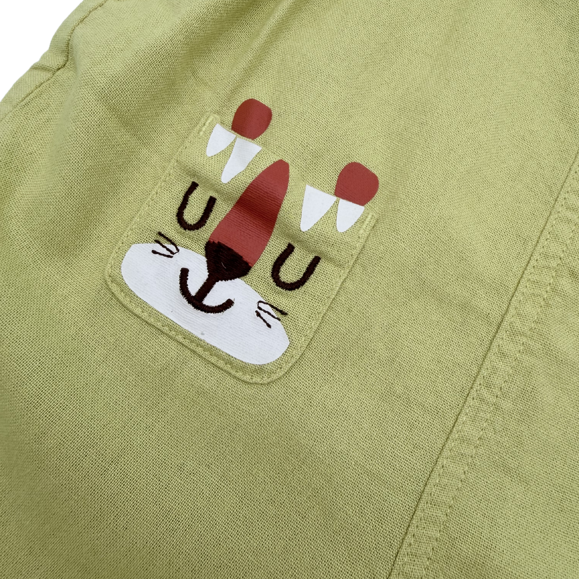 Salopette courte kaki à motifs animaux — 18 mois